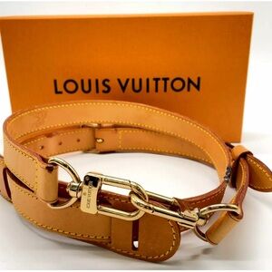 A Louis Vuitton Duffle Strap.